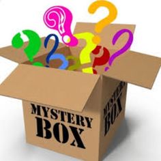 an open box with question marks on it and the words mystery box written in multicolored letters