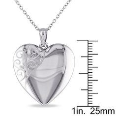 This attractive quadruple heart locket necklace is crafted of premium sterling silver with a polished finish. This etched floral detailed pendant hangs from an 18-inch cable chain with a spring ring clasp. | Belk & Co Engraved Heart Locket Pendant with Chain in Sterling Silver, White Etched Silver Jewelry For Mother's Day, Elegant Etched Heart Pendant Jewelry, Silver Etched Necklace For Valentine's Day, Valentine's Day Silver Etched Necklace, Silver Heart Pendant Locket Necklace With Polished Finish, Elegant Engraved Double Heart Locket Necklace, Elegant Double Heart Engraved Locket Necklace, Stamped 925 Heart Pendant Keepsake Jewelry, Engraved Open Heart Locket Necklace In White Gold