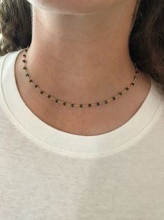 we love our rosary beads soooo much so we had to make a choker! these are simple, cute & available in turquoise and black. -1 rosary bead choker in your choice of color (15 inch)every piece of jewelry is handcrafted and/or assembled at bubs & sass. we pay a lot of attention to detail and want our customers to be happy! please reach out if we haven't accomplished this. all of our products are nickel and lead free.thank you for choosing bubs & sass. we are so very grateful. Adjustable Dainty Black Choker, Adjustable Black Beaded Chain Choker, Dainty Black Beaded Necklace With Round Beads, Dainty Black Beaded Chain Necklace, Dainty Adjustable Black Beaded Jewelry, Dainty Black Beaded Necklace, Adjustable Black Choker With Tiny Beads, Black Wire Wrapped Choker Jewelry, Adjustable Single Strand Black Choker