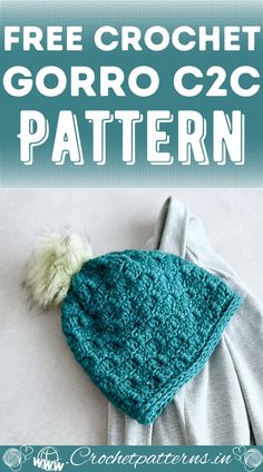 a crocheted hat with a white pom - pom on it and the words free crochet gorro c2c pattern