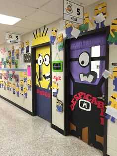 the classroom door is decorated with paper cut outs and characters from the movie despicable me