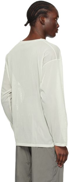 Semi-sheer polyester mesh T-shirt. · Crewneck · Tennis-tail hem · Dropped shoulders Supplier color: A-off white White Casual Top With Mesh Sleeves, Casual White Top With Mesh Sleeves, Casual White Tops With Mesh Sleeves, Casual White Sheer Top, White Mesh Crew Neck Top, White Crew Neck Mesh Top, White Casual Mesh Top With Mesh Sleeves, Casual White Mesh Top With Mesh Sleeves, White Mesh Casual T-shirt