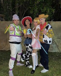 three people dressed up as toy story characters