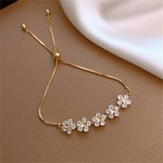 Bracelets Gold Flower Charm Bracelet For Women Fashion Jewelry Accessories Party Gifts Gender: Women, Girl Metals Type: Zinc alloy Bracelets Type: Charm Bracelets Fine or Fashion: Fashion Style: TRENDY Occasion : Party/Beach/Birthday/Wedding/Engagement/Dialy Use https://www.etsy.com/shop/HappyDayLight Simpul Makrame, Luxury Bracelet, Sparkle Jewelry, Star Bracelet, Hand Jewelry, Rhinestone Bracelet