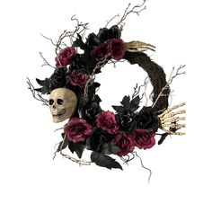 a wreath with flowers and a skull on it