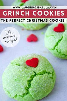 green cookies with red hearts on top and text overlay that reads, grin cookies the perfect christmas cookie