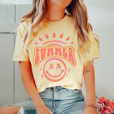 Unleash your summer smile with this vibrant Orange Comfort Color Tee. Perfect for sunny days, this tee will keep you cool and stylish. So go ahead, spread those summer vibes with this playful and comfortable tee! Design is Printed Direct to Garment. See Size Guide for Comfort Color Unisex Tee