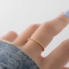 Dainty beaded ring that is perfect for stacking or wearing alone for a minimalist look! - - - D E T A I L S - - - * Made of 925 Sterling Silver * We use a THICK, DURABLE 14k Gold or Rhodium plating - for a piece that will last you years to come! * Nickel-free & Hypoallergenic * Available in Sizes 4, 5, 6, 7, 8, 9, or 10 * Ring width: 1.3mm Ring Sizer- https://www.etsy.com/listing/1240904225/ring-sizer-reusable-ring-sizer-plastic?click_key=b5e074cfb419bcfddc2d9f2ce4b2f5376e4b8de0%3A1240904225&cli Chunky Earrings, Friendship Rings, Braided Ring, Bridesmaid Gifts Jewelry, Zierlicher Ring, Twist Ring, Gold Ring Stack, Rings Simple, Minimalist Rings