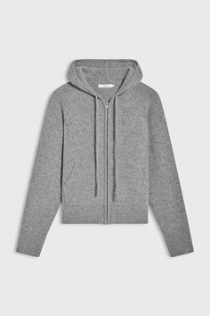 Discover the perfect blend of style and functionality with our Wool Hoodie Zip Up Sweater. Featuring a relaxed hoodie design with adjustable drawstrings, this sweater combines the cozy embrace of wool with the casual convenience of a zip-up hoodie.