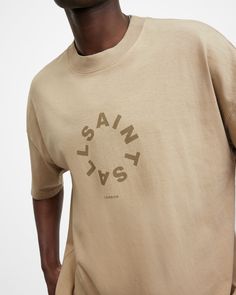 Oversized and easy – try the Tierra T-Shirt, it's becoming a new favorite around here. Made from organic cotton in a classic crew-neck, short-sleeve shape. Our new circular graphic is on the chest and back, it's AllSaints all over.   This t-shirt is designed to be worn oversized If you are between sizes or prefer a closer fit, we recommend sizing down Pullover Crew neck Short sleeves AllSaints logo Thicker ribbed neckband Boston Taupe, London Today, Sweater Sale, Sweaters And Jeans, Jeans For Sale, All Saints, Jean Shirts, Logo T Shirt, Shirt Print