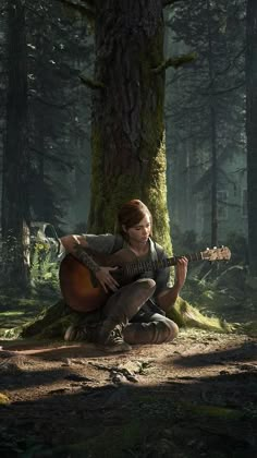 a woman sitting on the ground with a guitar in front of a tree and mossy forest