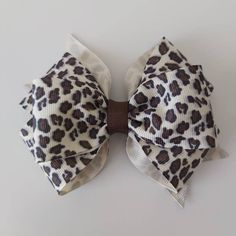 "This listing is for a Leopard Print Hair Bow or Headband. -Available in Alligator Clip, French Barrette or Elastic Headband -Bow Size - Approximately 4\" -Material - 1.5\" High Quality Grosgrain Ribbon, Thread, Glue and Love. -Made in a Pet/Smoke free home. -End Heat Sealed -Slightly Stiffened -Current processing time is 1-3 business days before shipping. If you need it by a specific day, please contact me. -We have FLAT RATE shipping. Shipping is the same for any quantity purchased! -Thank you Animal Print Hair, Leopard Print Hair, Halloween Hair Clips, Hair Bows For Girls, Halloween Hair Bows, Girls Hair Bow, Bows For Girls, Toddler Hair Bows, Handmade Hair Bows