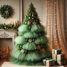 a green christmas tree with lights and presents