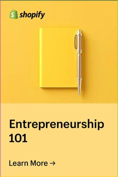 a yellow notebook with a pen sitting on top of it next to the words, shopify