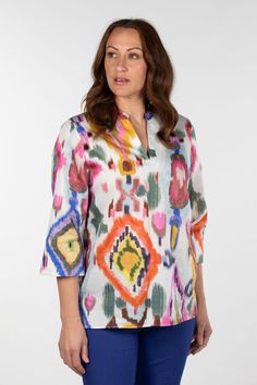 The Maya Ikat Tunic is a 3/4 sleeve tunic featuring a stunning and vibrant ikat print that will add a touch of excitement to your summer wardrobe. Crafted in Europe, this top is fashioned from 100% cotton fabric, making it your ultimate summer companion. If you adore this print, don't miss out on the Maya Ikat Dress – it's a perfect match for your style. Tunic front Ikat all over print 3/4 sleeve length Designed and made in Europe 100% Cotton 1st Model: Erin is wearing a size 10. She is 172cm tall with a 96cm bust, 74cm waist and 94cm hips. 5th Model: Sophie is wearing a size 10. She is 177cm tall with a 93cm bust, 79cm waist and 101cm hips. Ikat Dress, Image Bank, Ikat Print, Fabric Making, Ethical Clothing, Summer Wardrobe, Print Tops, Perfect Match, All Over Print