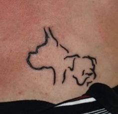 a dog's head is shown on the side of a woman's stomach