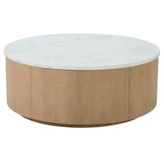 a white marble and wood coffee table with circular wooden base on an isolated white background