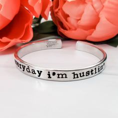 This one's for the ones hustlin' toward their dreams! This beautiful adjustable cuff bracelet reads "everyday i'm hustlin'" hand-stamped in vegan ink. It's a fantastic accessory to gift the friend to show how much you're inspired by their zealous efforts to make their dreams and ambitions a reality.This cuff looks perfect alone and is also great for stacking. Each bracelet is handmade to order for you and each one is a little different due to the nature of hand stamping.All bracelets come simply The Future Is Female, Future Is Female, Personalised Bangle, Pink Copper, Wrist Bracelet, Sterling Bracelets, Cuff Bangle Bracelet, Stacked Bangles, Adjustable Bangle