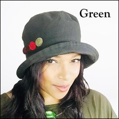 Stay warm & bone dry through the fiercest rainstorm while wearing this stylish & practical waxed rain hat! Perfect to pull out of a pocket and put on once the rain starts - and this great green will match your Barbour too! This waterproof bucket hat has SO much style & looks amazingly chic for such a practical hat! Fun colourful buttons - and the back split brim is ideal to play around with; it can be turned up or down according to the look you want.  Adjustable to fit almost all head sizes and Stylish Womens Hats, Waterproof Hat, Blue Bucket Hat, Rain Hat, Black Bucket, Hat For Women, Style Looks, Cute Hats, Beautiful Hats