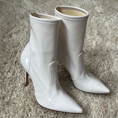 White Gianvito Rossi Patent Leather Sock Boots In Size It 38 (Made In Italy). Runs About A Half Size Small (I'm Usually A 37.5). Still In Very Good Condition With Light Scuffs On The Bottom. Measurements: Boot Length 5.85 In, Width 8.19 In, Heel Height 3.31 In Cream Pointed Toe Fitted Boots, Fitted Cream Boots With Pointed Toe, Fitted Cream Pointed Toe Boots, Cream High Heeled Boots, Fitted Cream High Heel Boots, Cream Fitted Round Toe Heeled Boots, White Fitted Heeled Boots With Pointed Toe, Chic White Closed Toe Heeled Boots, White Formal Boots For Winter