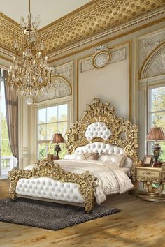 an ornate gold and white bedroom with chandelier, bed, nightstands and windows