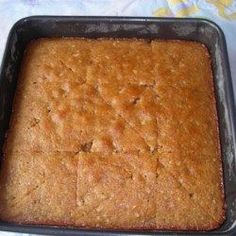 a pan filled with cake sitting on top of a table