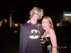 two people dressed up as batman and catwoman