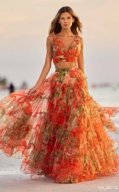 Sherri Hill 56151 Orange Print Summer Wedding A-line Skirt, Beach Two-piece Dress With Flowy Skirt, Two-piece Flowy Beach Dress, Summer Evening Floral Skirt, Summer Evening Skirt With Floral Print, Summer Evening Floral Print Skirt, Summer Two-piece Dresses With Tiered Skirt, Summer Two-piece Tiered Skirt Dresses, Chic Two-piece Dress With Flowy Skirt For Spring