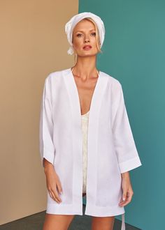 This open wrap linen Kaftan will take you from beach cover up to sun-downers by the resort pool bar.  Shop now at facilblanco.com #MastersOfLinen Elegant Summer Relaxation Kimono, Elegant Linen Kimono For Summer, Elegant Linen Summer Kimono, Linen Beachwear Cover-up For Spring, Linen Cover-up For Spring Vacation, Linen Wrap Kimono For Vacation, Vacation Linen Wrap Kimono, Linen Kimono For Beach In Summer, Summer Linen Kimono For Beach