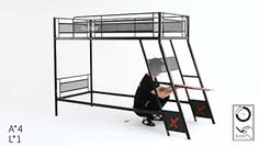 a person sitting at a desk in front of a metal bunk bed with ladders