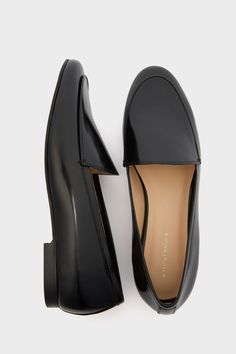 Say hello to your new closet staple, the Black Leather Rowan Loafers. Made from a high-quality smooth leather, these sleek beauties will seamlessly take you from desk to drinks with their elevated silhouette and low stacked heel. Pair with trousers and a blazer or opt for casual denim and a sweater. Round toe Loafer silhouette Low stacked heel Material: 100% Spazzolato Calf Leather Sleek Patent Leather Office Loafers, Classic Flat Heel Tassel Loafers For Office, Sleek Business Loafers With Leather Sole, Classic Patent Leather Flats For Formal Occasions, Sleek Leather Flats For Business, Sleek Patent Leather Loafers For Work, Classic Workwear Flats With Plain Toe, Classic Patent Leather Flats For Fall, Sleek Patent Leather Loafers With Almond Toe