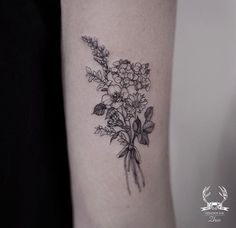 a small bouquet of flowers on the right forearm tattoo design by artist unknown, in black and white