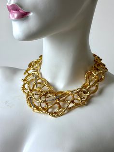 Vintage 90s Elizabeth Taylor For Avon "Treasured Vines" 22k Gold Plated Diamanté Swarovski Crystal Necklace. Stunning Vintage 90s Elizabeth Taylor "Treasured Vines" Necklace. Exquisite Craftsmanship To This Gorgeous Piece. Created in 22K Gold Plating With Rows of Round Cut Diamanté Swarovski Crystals. High Quality Design, Style, and Materials make This Statement Making Necklace Irresistible. Perfect Perfection in an Extraordinary Way. Simply Divine. Has Adjustable Chain With Claw Clasp Closure. Has Weight. Not For The Faint of Heart. 17" Necklace  .75" Lobster Clasp 3" Adjustable Chain SIGNED  Preowned Vintage Condition. Has Lite Vintage Wear/Lite Surface Wear. Has Some Lite Tarnish Where The Links Connect. Great Vintage Condition. Designer Yellow Gold Evening Necklace, Designer Gold Necklaces For Evening, Designer Yellow Gold Necklaces For Evening, Designer Yellow Gold Necklace For Evening, Designer Gold Necklaces, Designer Gold Necklaces For Anniversary, Opulent Gold Evening Necklaces, Opulent Gold Necklaces For Evening, Opulent Gold Evening Necklace