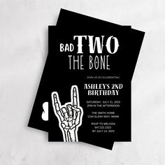 a black and white party card with the word bad two on it