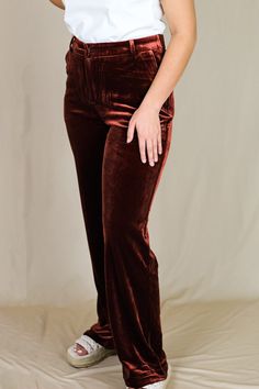 Our "Cassidy Velvet Pants" are a amber rust color wide leg pant made out of velvet like material. It has an elastic band for comfort and functioning front pockets. Our model is wearing a size small. Velvet Pants, Wide Leg Pant, Rust Color, Dress Accessories, Shoe Collection, Elastic Band, Wide Leg Pants, Amber, Rust