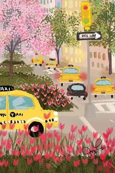 a yellow taxi cab driving down a street next to tall buildings and trees with pink flowers