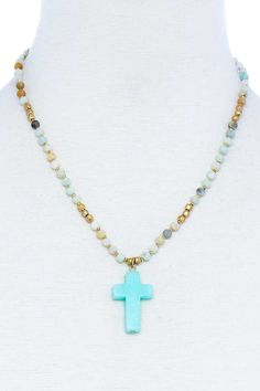 Fulfilled by our friends at Coco CharliIntroducing our Chic Beaded and Cross Pendant Necklace, a sophisticated and versatile accessory that seamlessly combines elegance with a touch of spirituality. Choose your preferred color from the available options: Black, Brown, Mint, White, Grey, and Turquoise. This necklace is designed to make a statement and add a touch of chic charm to your ensemble.Key Features:1. Cross Pendant: The necklace features a chic cross pendant, symbolizing spirituality and Flower Boutique, Necklace Stand, Metal Heart, Necklace Black, Cross Pendant Necklace, Elegant Accessories, Metal Necklaces, Style Gift, Bead Designs