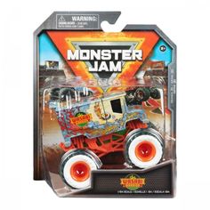 the monster jam truck is in its box with orange wheels and an orange light on it's head