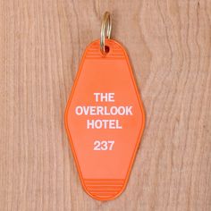 an orange luggage tag that says the overlook hotel