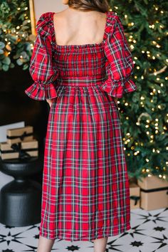 All I want for you is to be able to check out this adorable midi dress! It's so feminine and that tartan plaid print is absolutely perfect for the holiday season! This midi dress is going to look so good with heels or booties for any holiday party! Square neckline Smocked bust 3/4 sleeves with elastic cuffs Tied sash waist Plaid print No stretch however the smocking extends the bust *Plaid Colors: red, blue, hunter green, yellow, white. Baileigh is wearing the small. Red And Green Christmas Family Pictures, Red Tartan Dress, Plaid Christmas Dress, Holiday Fits, Tartan Plaid Dress, Dresses Church, Christmas Dress Women, Tassels Fashion, Crochet Clothing