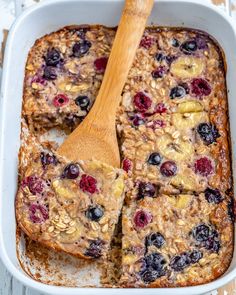 baked oatmeal with blueberries and bananas in a casserole dish