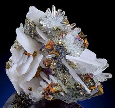 a cluster of crystals sitting on top of a table