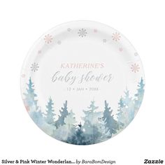 a paper plate with watercolor trees and snowflakes on the bottom, says baby shower