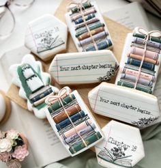 decorated cookies are sitting on top of a table