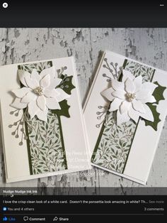 two cards with white flowers on them and green trimmings, one is for christmas