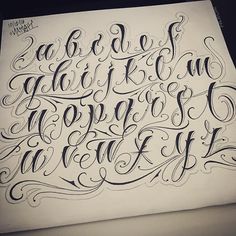 an artistic calligraphy work done in black ink