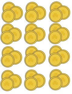 a set of gold coins with shamrocks on them, all in different shapes and sizes