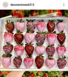 chocolate covered strawberries are arranged in a box