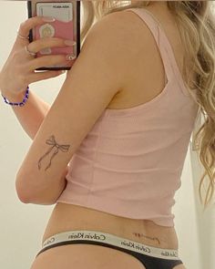 princess tattoo tramp stamp Dumbest Tattoos, Kpop Tattoos, Small Girly Tattoos, Princess Tattoo, Pretty Hand Tattoos, Tattoo Skin, Bow Tattoo, Petite Tattoos, Discreet Tattoos