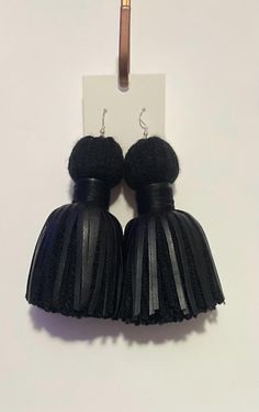 Introducing our black leather fringe tassel earrings, a stylish and trendy accessory that can add a unique touch to any outfit. Made of durable black leather, these earrings are designed to last and withstand frequent wear. The fringe tassel design adds movement and texture to the earrings, making them more eye-catching and interesting to look at. These earrings are perfect for those who want to make a statement with their accessories. The black leather material gives them a bold and edgy look, while the fringe tassel design adds a touch of bohemian style. Whether you're dressing up for a night out or adding a finishing touch to your everyday look, these earrings are sure to turn heads. Overall, our black leather fringe tassel earrings are a must-have accessory for anyone who wants to add Earrings Making, The Fringe, Black Fringe, Wedding Jewelry Earrings, Edgy Look, Tassel Fringe, Leather Fringe, Trendy Accessories, Tassel Earrings